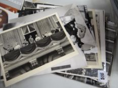 A collection of black and white still photographs of the monarchy, The Queen, dignitaries and actors