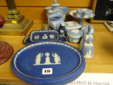 A quantity of mixed blue Wedgwood Jasperware table items including two oval dark blue trays
