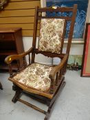A sprung American-style semi-upholstered rocking-chair