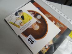 A signed message from Beryl Cook the artist on a Beryl Cook postcard together with a Beryl Cook