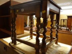 A nest of two barley-twist coffee tables