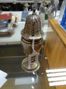 A hallmarked English silver sifter sugar shaker