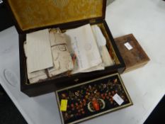 An antique sewing box containing old letters and ephemera and two further boxes