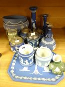 A quantity of blue & green Wedgwood Jasperware table items including candlestick holders, footed