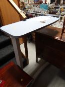 An as new adjustable medical-ward type over-bed table