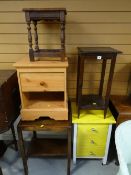 A painted three-drawer chest, a pine effect chest, two square topped tables, stool, tea trolley