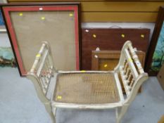 A French painted cane work stool together with two wooden / glazed display cases