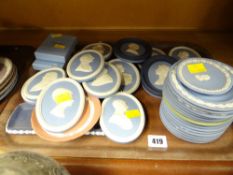 A quantity of Wedgwood oval commemorative portrait plaques and sundry blue Wedgwood Jasperware
