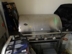 A Fire Mountain professional chrome gas barbecue and accessories