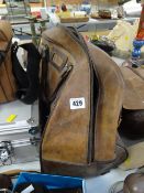 A retro Adidas sports holdall in two-tone brown with printed Adidas logo