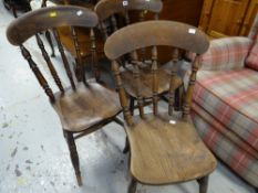 A set of three elm / wooden chairs
