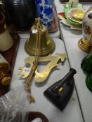 A brass bell, brass trivet stand etc
