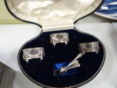 A cased part set of silver basin salts (one missing)