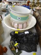 A vintage address embosser, a Kenrick stork doorstop, similar Kenrick lion doorstop and two