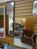 Two wall mirrors and a framed print