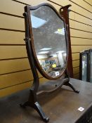 A shield shaped antique toilet mirror