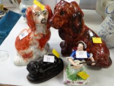 Treacle glazed seated pottery spaniel dog, a traditional Staffordshire spaniel, a figurine with