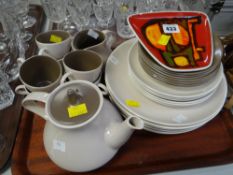 A Poole mushroom coloured two-tone breakfast set and a Poole England abstract dish