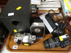 Two SLR cameras and a pair of Logitech speakers etc