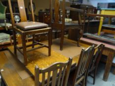 Five sundry chairs with studded and leatherette seat pads together with a plank seated carved back