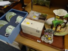 Two boxed glass photo frames, Royal Doulton wall plate, continental figure group, boxed pair of