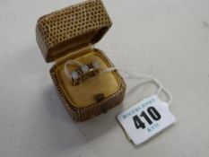 A 9ct gold three opal stone ring