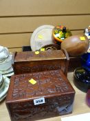 An antique oak cutlery tray, two small chopping boards, carved wood boxes etc
