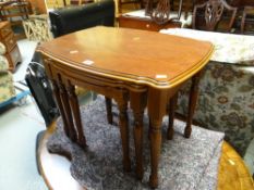 A modern nest of three coffee tables