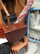 A Danish lightwood nest of three tables with tiled tops together with a small reproduction