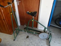 A vintage tubular metal exercise bike