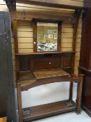 A large vintage mirror backed hall stand