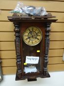 A vintage mahogany cased Vienna-style wall clock