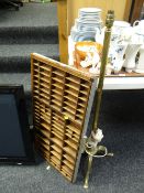 A 1950s brass effect standard lamp together with an old printers letter tray
