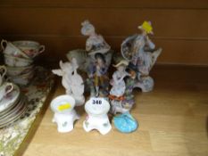 Parcel of continental figures including Naples ware figurines, Austrian candle holders etc