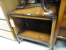 A vintage polished tea trolley