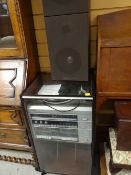 A Triumph TS6500 cabinet hi-fi, circa 1980 together with speakers