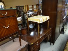 A vintage Strongbow mahogany four-piece bedroom suite comprising double wardrobe, mirror backed