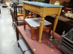 A small Formica topped table together with three other smaller square Formica topped coffee tables