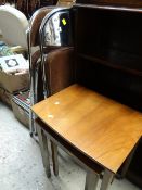 A pair of folding chrome & corduroy cushioned chairs together with a nest of three coffee tables