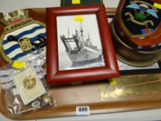 A parcel of military items including Special Boat Service shield, a volume of the Royal Marines