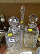 Three good cut glass decanters