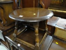 A Priory or style circular topped coffee table