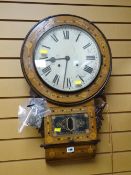 An inlaid American wall clock with circular face and Roman numerals