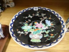 A Chinese Famille Noir charger