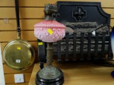Parcel of items to include pink glass based oil lamp, brass effect warming pan and a vintage log