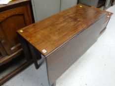 A nineteenth century drop leaf dining table