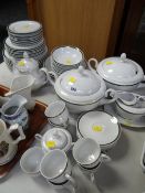A large parcel of Epiag Czechoslovakian dinner & tea ware in a green & gold bordered pattern