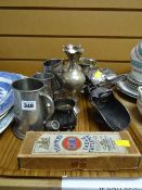 A tray of metal ware including pewter tankards, boxed cutlery etc