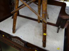 A vintage mahogany inlaid marble topped and backed wash stand