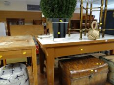 A large vintage painted pine and Formica topped work table together with a smaller lightwood table